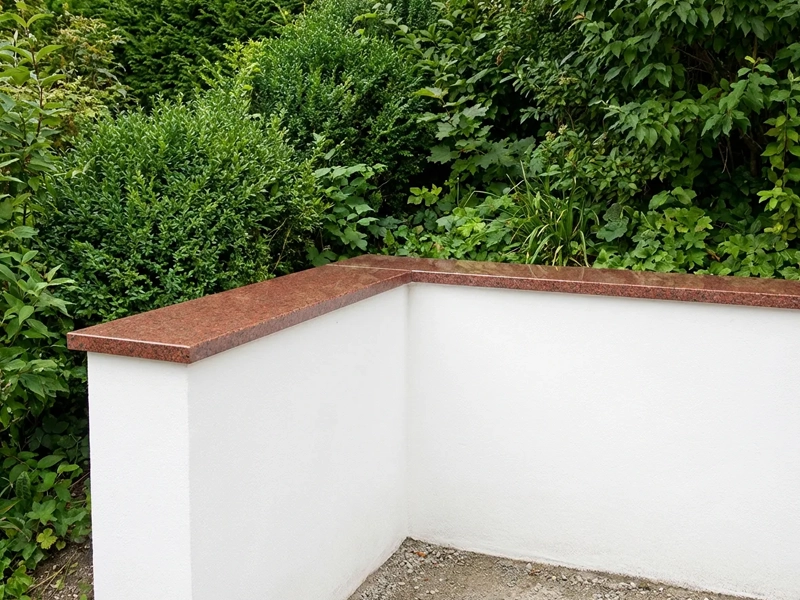 Mauerabdeckplatten aus rotem Granit, 2 cm dick, Oberfläche poliert.